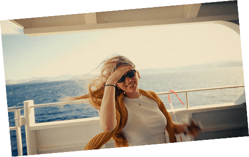 A colleague enjoying the sea breeze on a boat